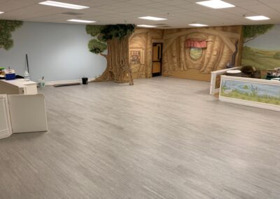 Glue down luxury vinyl plank in Elk Grove church child care center.