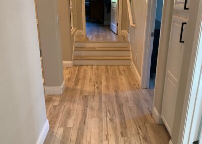 Folsom luxury vinyl plank with a few steps.
